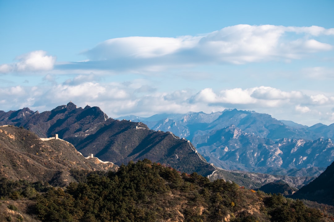 Jinshanling Great Wall at sunrise — golden light on ancient stone